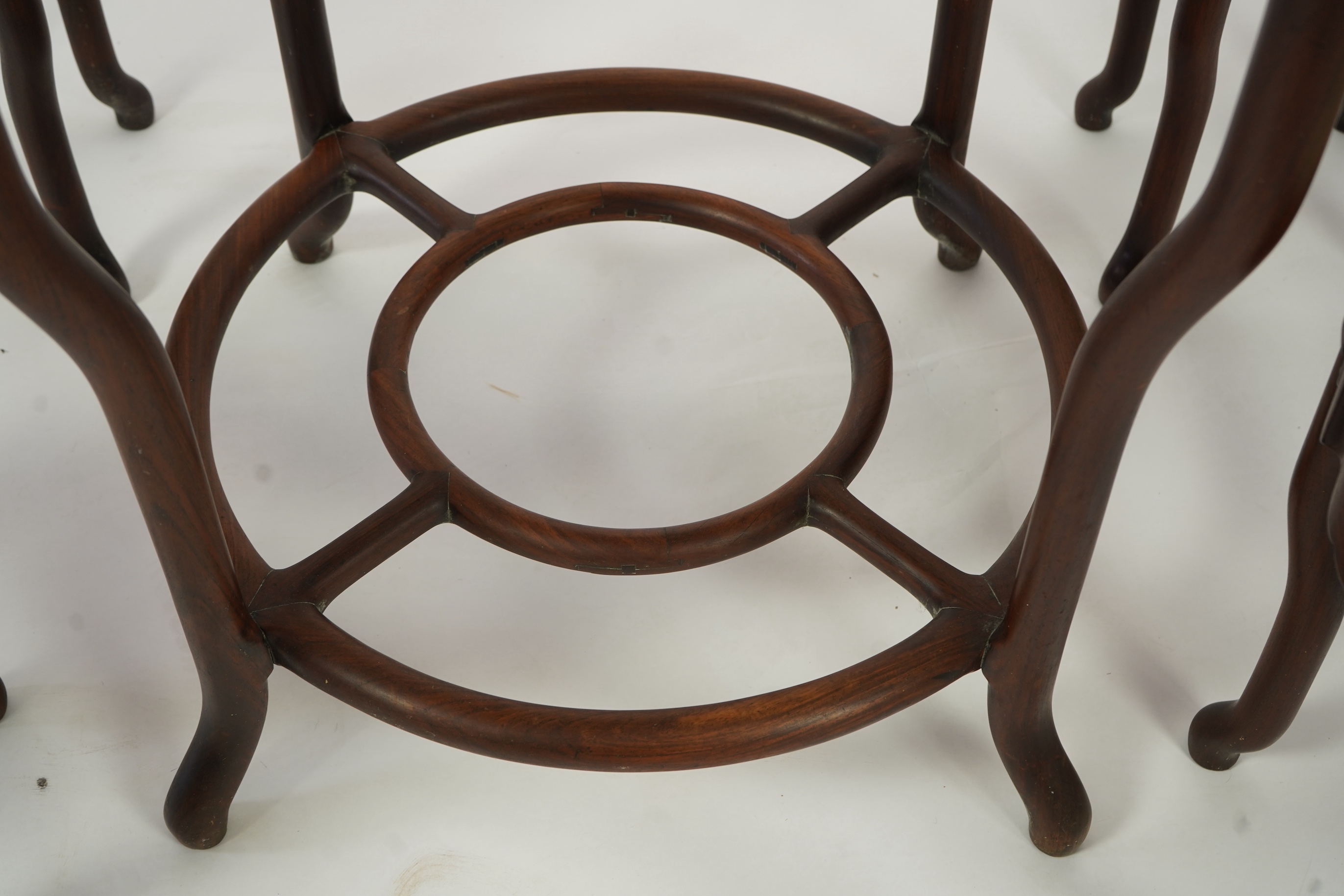 A Chinese dreamstone marble inset hongmu table and four matching stools